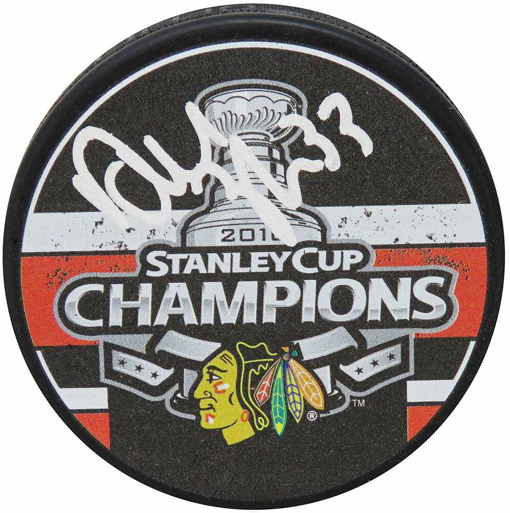 Dustin Byfuglien Signed Blackhawks 2010 Stanley Cup Champs Logo Hockey Puck - Schwartz Authenticated