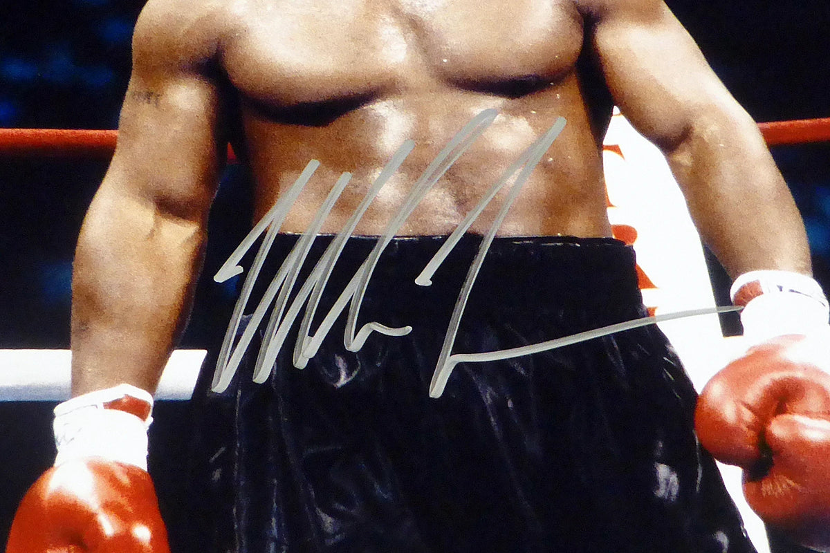 Mike Tyson Autographed 11x14 Ring Posing Photo (Silver Marker Signature) - Beckett BAS Certified
