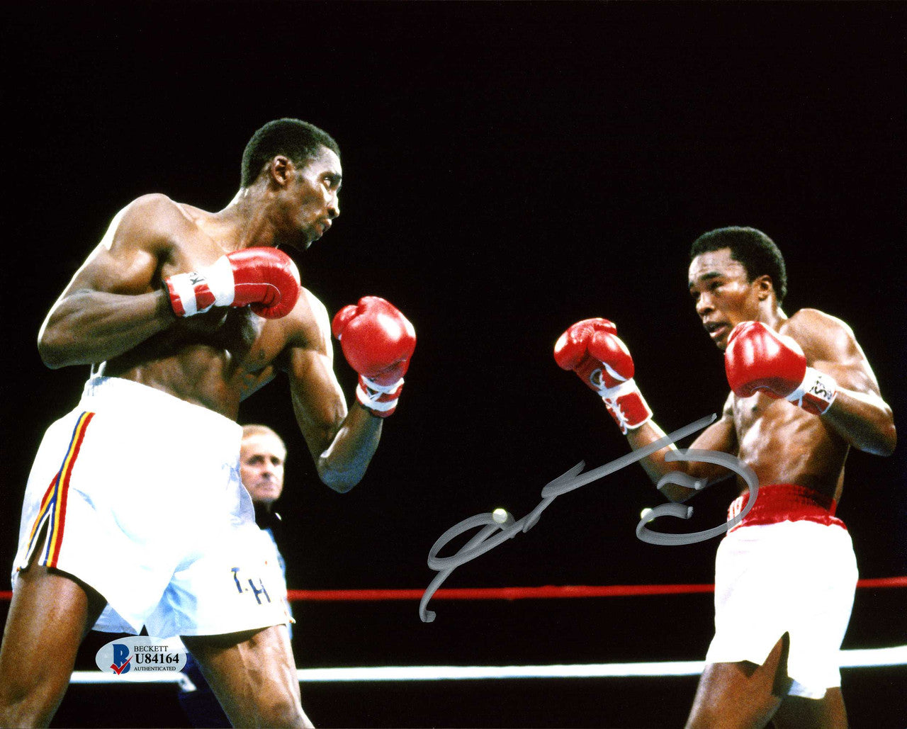 Sugar Ray Leonard Autographed 8x10 Photo vs. Thomas "Hitman" Hearns Beckett BAS Stock #178108